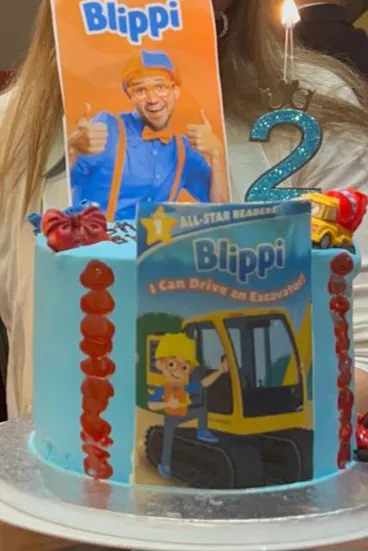 Blue character birthday cake for a second birthday